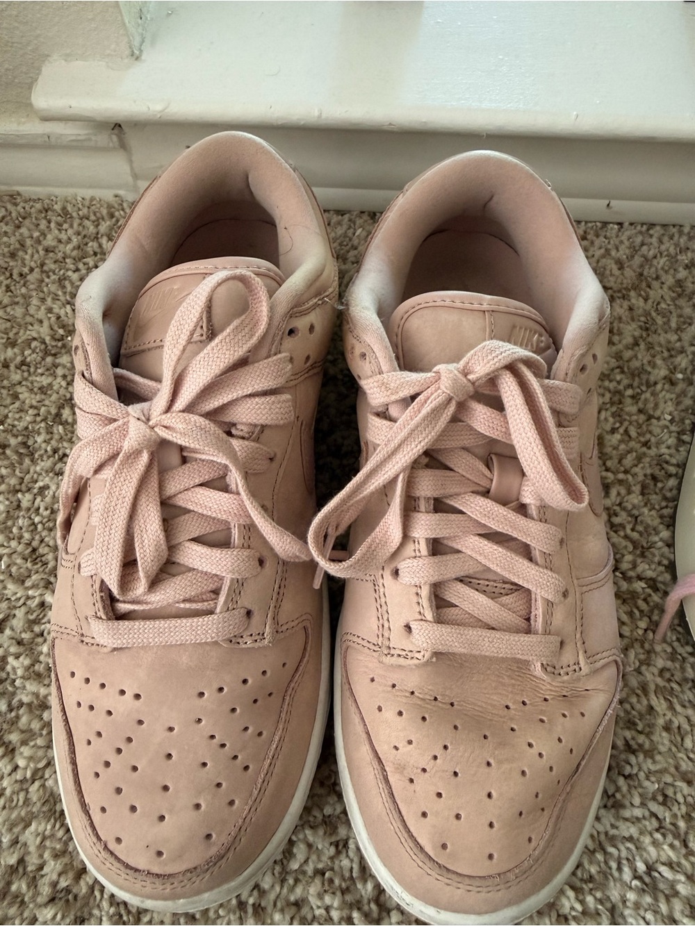 Nike Low-Top Sneakers in Pale Pink